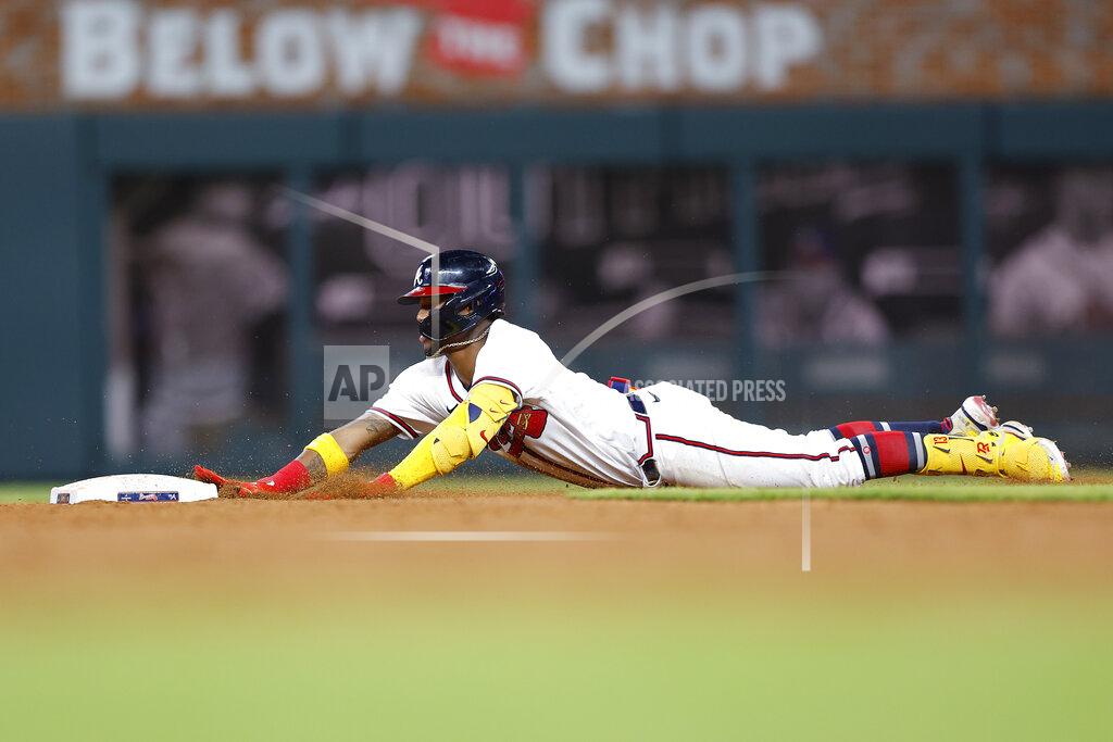 Todd Kirkland Atlanta Braves Ronald Acuna Jr. slides into second base in the ninth inning of a baseball game against the Philadelphia Phillies, Tuesday, May 24, 2022, in Atlanta. (AP Photo/Todd Kirkland)