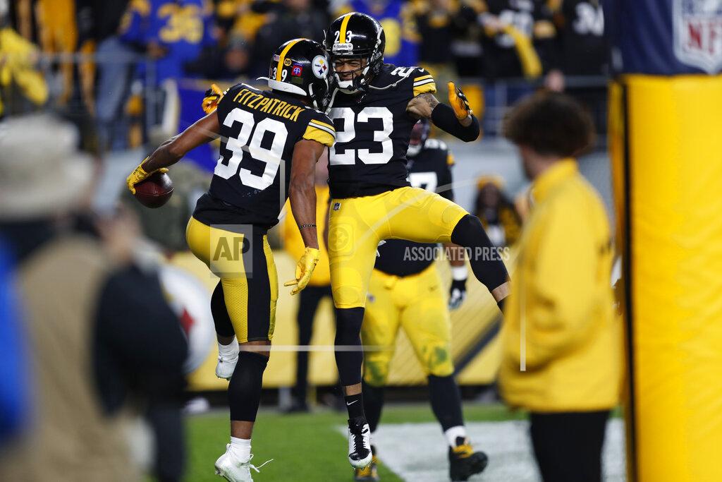 Keith Srakocic Pittsburgh Steelers free safety Minkah Fitzpatrick (39) celebrates with Joe Haden (23) after his touchdown after intercepting a pass from Los Angeles Rams quarterback Jared Goff during the first half of an NFL football game in Pittsburgh, Sunday, Nov. 10, 2019. (AP Photo/Keith Srakocic)