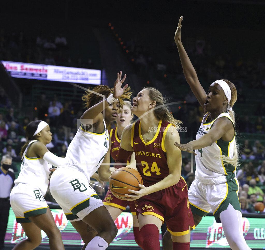 Rod Aydelotte Iowa State guard Ashley Joens, center, is guarded by Baylor forward NaLyssa Smith, left, and Queen Egbo, right, in the first half of an NCAA college basketball game, Sunday, Jan. 23, 2022, in Waco, Texas. (Rod Aydelotte/Waco Tribune-Herald via AP)