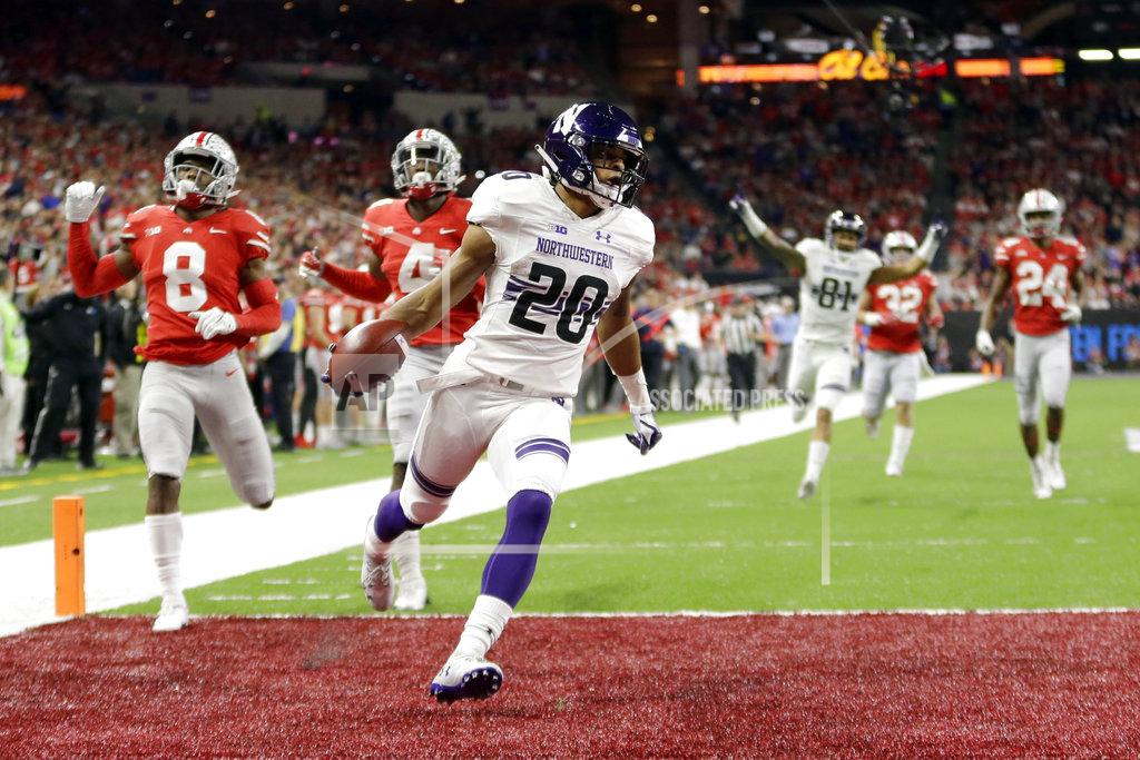 Aj Mast Northwestern running back John Moten IV (20) runs for a touchdown during the first half of the Big Ten championship NCAA college football game against Ohio State, Saturday, Dec. 1, 2018, in Indianapolis. (AP Photo/AJ Mast)