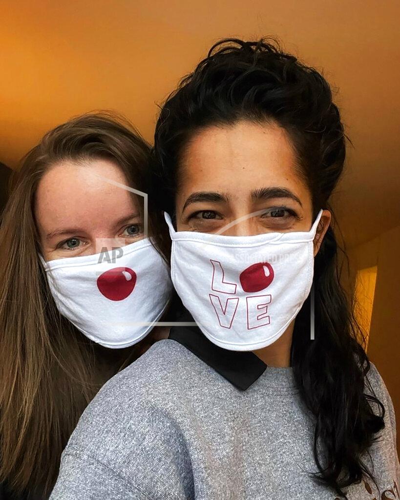 Uncredited This undated photo provided by Comic Relief’s Red Nose Day shows the special Red Nose Day masks that Walgreens employees will wear for the 2021 fundraising campaign. (Red Nose Day via AP)
