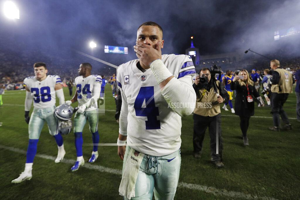 Jae C. Hong Dallas Cowboys quarterback Dak Prescott leaves the field after their loss to the Los Angeles Rams during an NFL divisional football playoff game Saturday, Jan. 12, 2019, in Los Angeles. (AP Photo/Jae C. Hong)