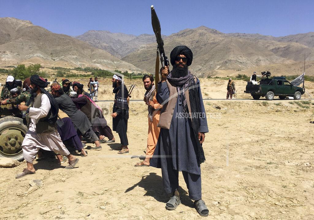 Mohammad Asif Khan Taliban soldiers stand guard in Panjshir province northeastern of Afghanistan, Wednesday, Sept. 8, 2021. (AP Photo/Mohammad Asif Khan)