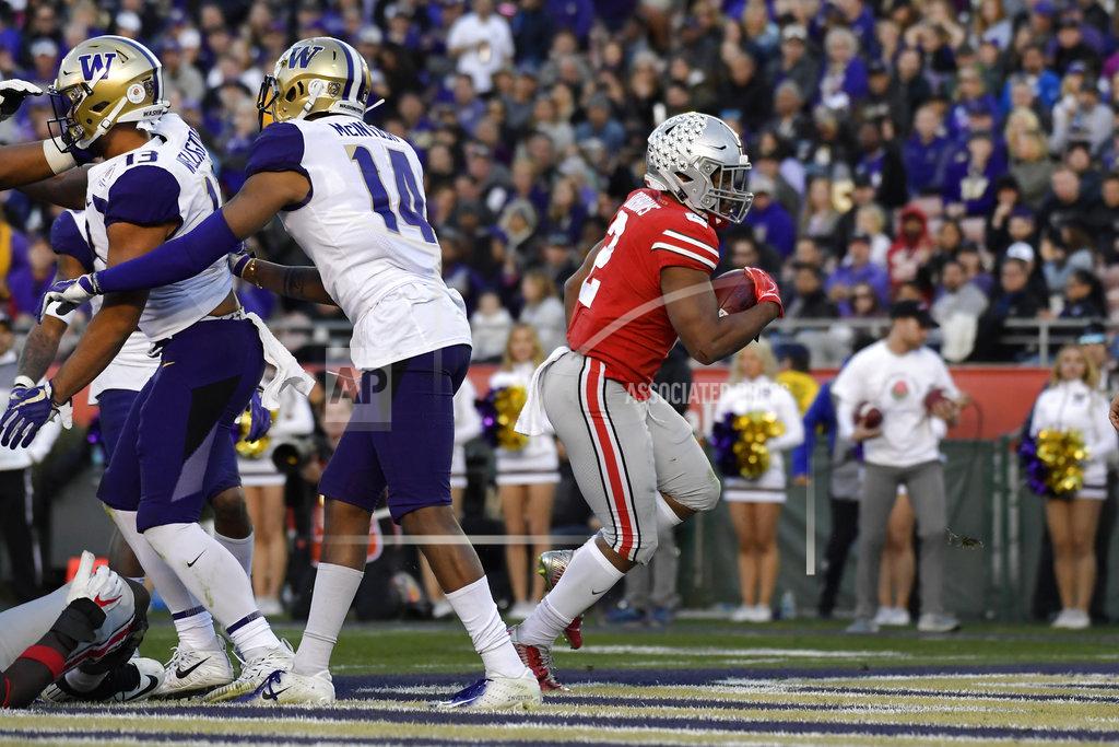 Mark J. Terrill Ohio State running back J.K. Dobbins scores against Washington during the second half of the Rose Bowl NCAA college football game Tuesday, Jan. 1, 2019, in Pasadena, Calif. (AP Photo/Mark J. Terrill)