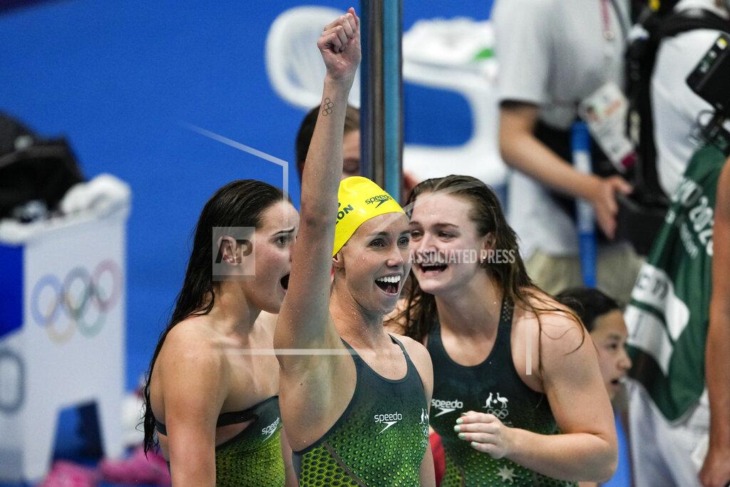 Kaylee McKeown, of Australia, and teammates celebrate winning the gold medal in the women's 4x100-meter medley relay final at the 2020 Summer Olympics, Sunday, Aug. 1, 2021, in Tokyo, Japan. (AP Photo/Jae C. Hong)