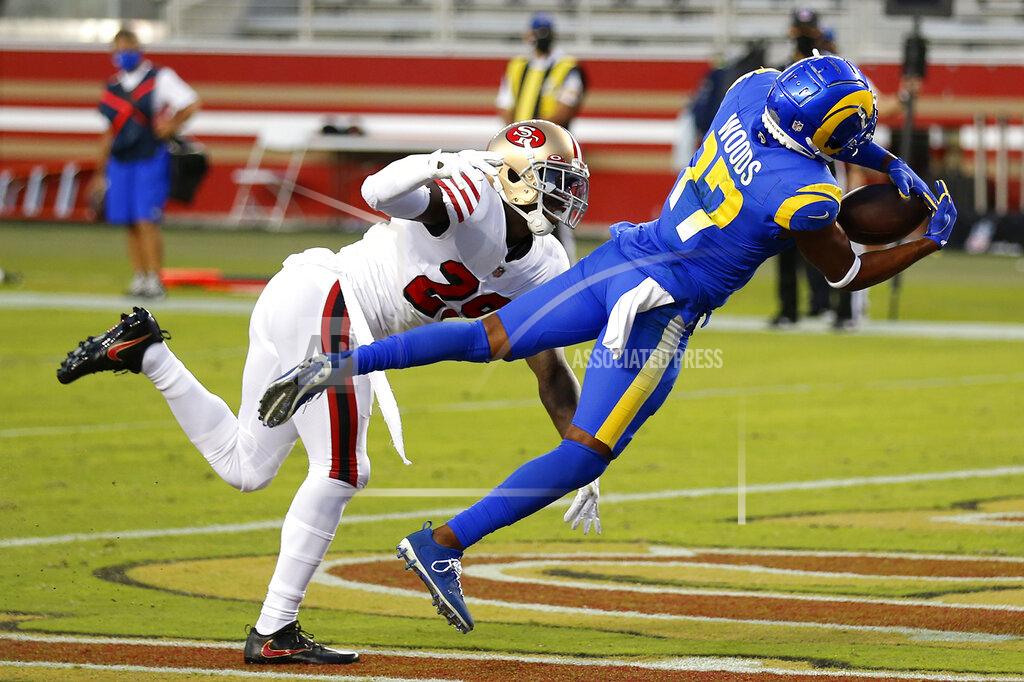Jed Jacobsohn Los Angeles Rams wide receiver Robert Woods (17) catches a touchdown pass in front of San Francisco 49ers strong safety Jaquiski Tartt during the first half of an NFL football game in Santa Clara, Calif., Sunday, Oct. 18, 2020. (AP Photo/Jed Jacobsohn)