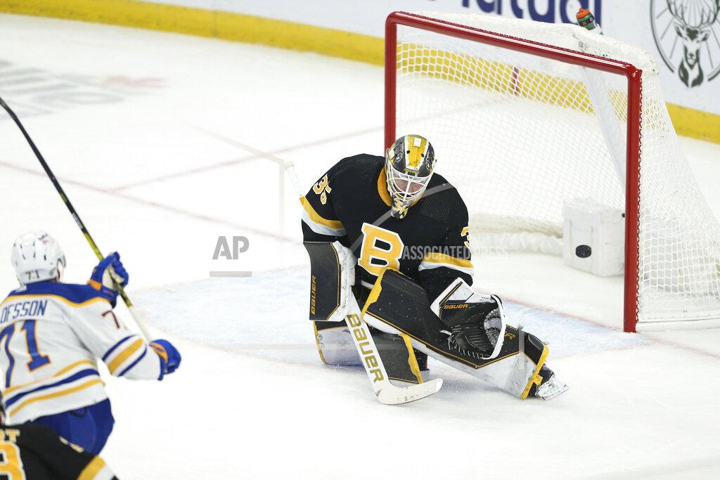 Joshua Bessex Buffalo Sabres right wing Victor Olofsson (71) scores a goal against Boston Bruins goaltender Linus Ullmark (35) during the third period of an NHL hockey game Friday, Oct. 22, 2021, in Buffalo, N.Y. (AP Photo/Joshua Bessex)