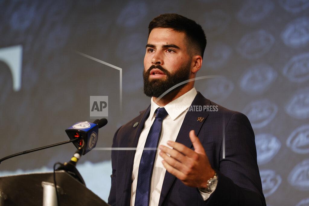 Nell Redmond Wake Forest quarterback Sam Hartman answers a question at the NCAA college football Atlantic Coast Conference Media Days in Charlotte, N.C., Wednesday, July 20, 2022. (AP Photo/Nell Redmond)