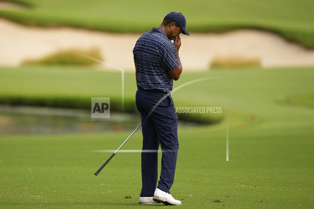 Eric Gay Tiger Woods reacts to his shot on the 13th hole during the first round of the PGA Championship golf tournament, Thursday, May 19, 2022, in Tulsa, Okla. (AP Photo/Eric Gay)