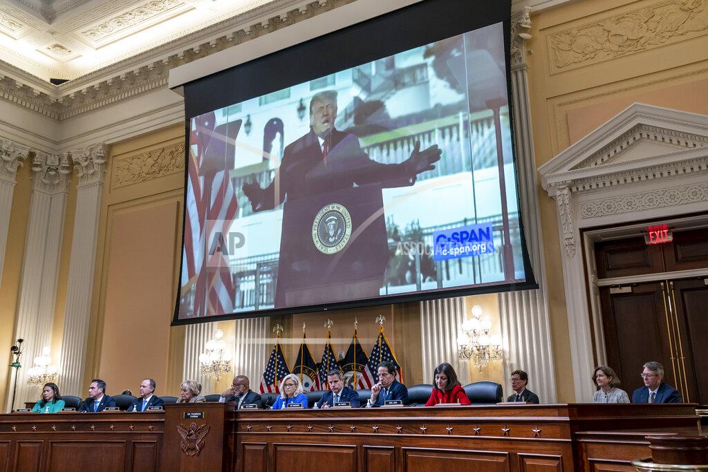 J. Scott Applewhite A video of former President Donald Trump speaking during a rally near the White House on Jan. 6, 2021, is shown as committee members from left to right, Rep. Stephanie Murphy, D-Fla., Rep. Pete Aguilar, D-Calif., Rep. Adam Schiff, D-Calif., Rep. Zoe Lofgren, D-Calif., Chairman Bennie Thompson, D-Miss., Vice Chair Liz Cheney, R-Wyo., Rep. Adam Kinzinger, R-Ill., Rep. Jamie Raskin, D-Md., and Rep. Elaine Luria, D-Va., look on, as the House select committee investigating the Jan. 6 attack on the U.S. Capitol holds its first public hearing to reveal the findings of a year-long investigation, at the Capitol in Washington, Thursday, June 9, 2022. (AP Photo/J. Scott Applewhite)