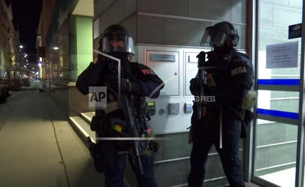 Uncredited In this image made from video, police at the scene after gunshots were heard, in Vienna, Monday, Nov. 2, 2020. Austrian police say several people have been injured and officers are out in force following gunfire in the capital Vienna. Initial reports that a synagogue was the target of an attack couldn’t immediately be confirmed. Austrian news agency APA quoted the country’s Interior Ministry saying one attacker has been killed and another could be on the run. (AP Photo)