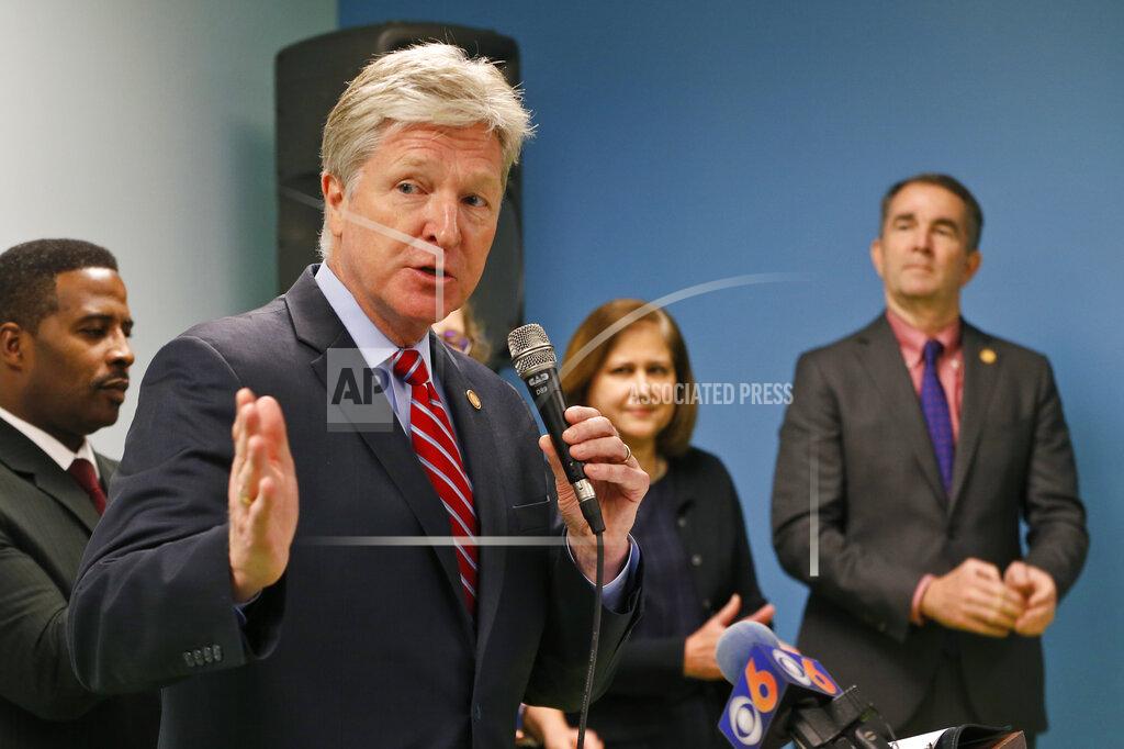 Steve Helber FILE - In this Jan. 3, 2020, file photo Virginia Secretary of Public Safety, Brian Moran, foreground, introduces Gov. Ralph Northam, right, and others during a news conference announcing Northam's legislative criminal justice priorities in Richmond, Va. In a 2020 meeting, members of Northam’s administration, including Moran, criticized the state inspector general over his ongoing investigation into the parole board and made clear they wanted to keep subsequent findings from being made public, according to an audio recording of the conversation. (AP Photo/Steve Helber, File)