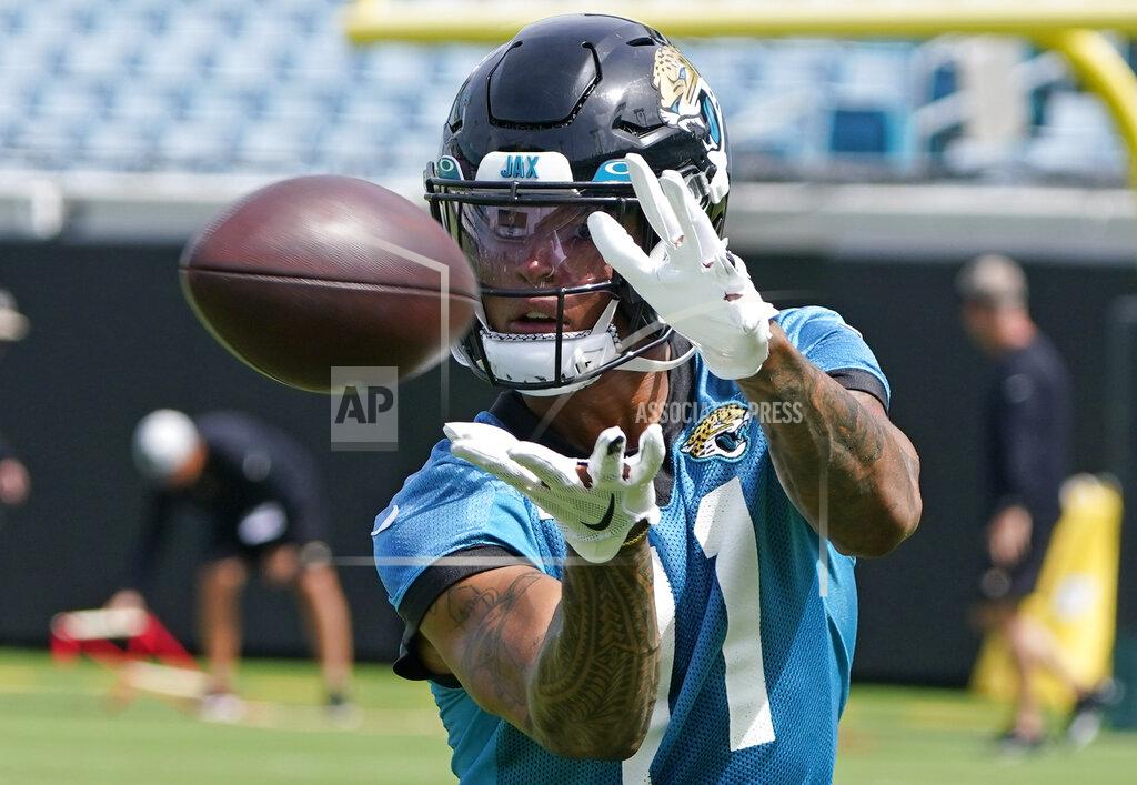 John Raoux Jacksonville Jaguars wide receiver Marvin Jones (11) goes through a passing drill during an NFL football practice, Monday, May 23, 2022, in Jacksonville, Fla. (AP Photo/John Raoux)