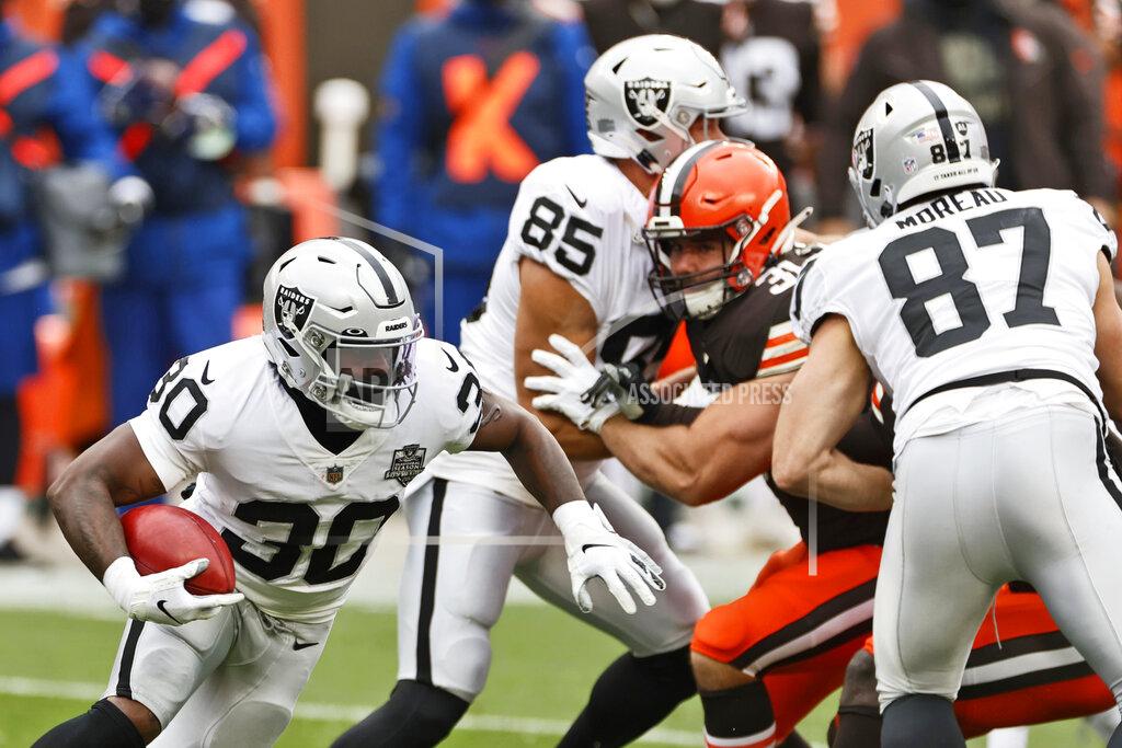 Ron Schwane Las Vegas Raiders running back Jalen Richard (30) returns the opening kickoff during the first quarter of an NFL football game against the Cleveland Browns, Sunday, Nov. 1, 2020, in Cleveland. (AP Photo/Ron Schwane)