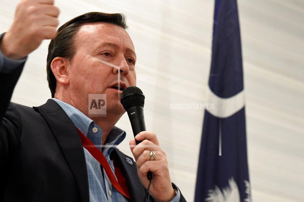 Meg Kinnard South Carolina Republican Party Chairman Drew McKissick gestures as he speaks to the Richland County GOP convention on Friday, April 30, 2021, in , S.C. (AP Photo/Meg Kinnard)