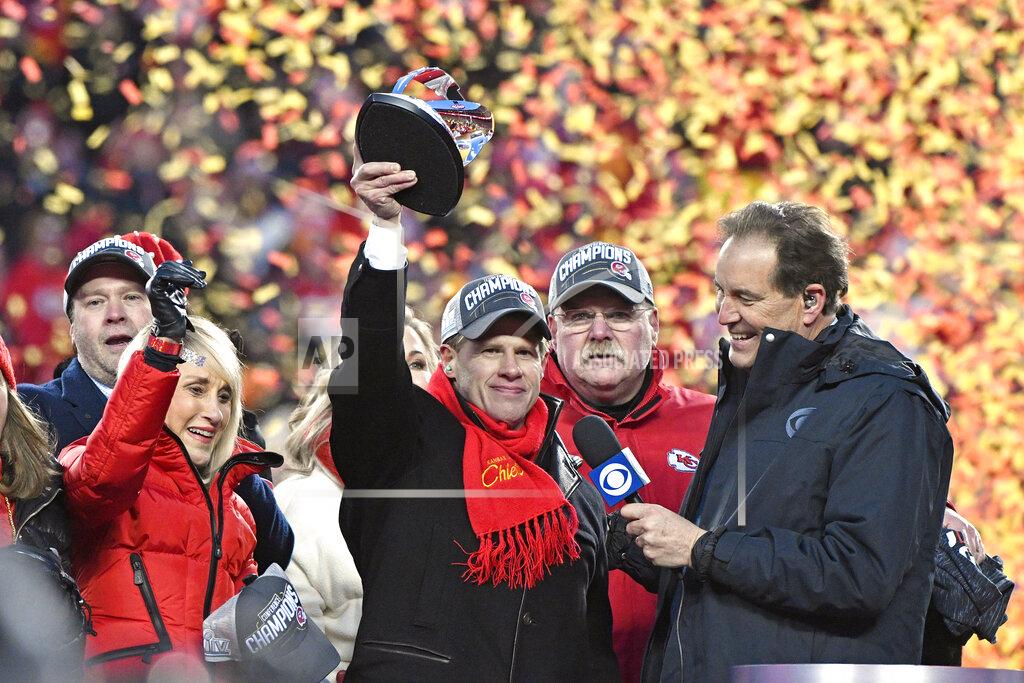 Jeff Roberson FILE - In this Sunday, Jan. 19, 2020, file photo, Norma Hunt, left, and her son Clark Hunt, center, owners of the Kansas City Chiefs, and Chiefs head coach Andy Reid, second right, celebrate after the AFC Championship NFL football game against the Tennessee Titans in Kansas City, Mo. Passing the family business onto the kids is a delicate chore, even when the whole world isn't watching. When it plays out in the NFL, everyone gets to see the successes and failures unveiled in real time. Clark Hunt of the Chiefs took over the team when his trailblazing father, Lamar, died in 2006. (AP Photo/Jeff Roberson, File)