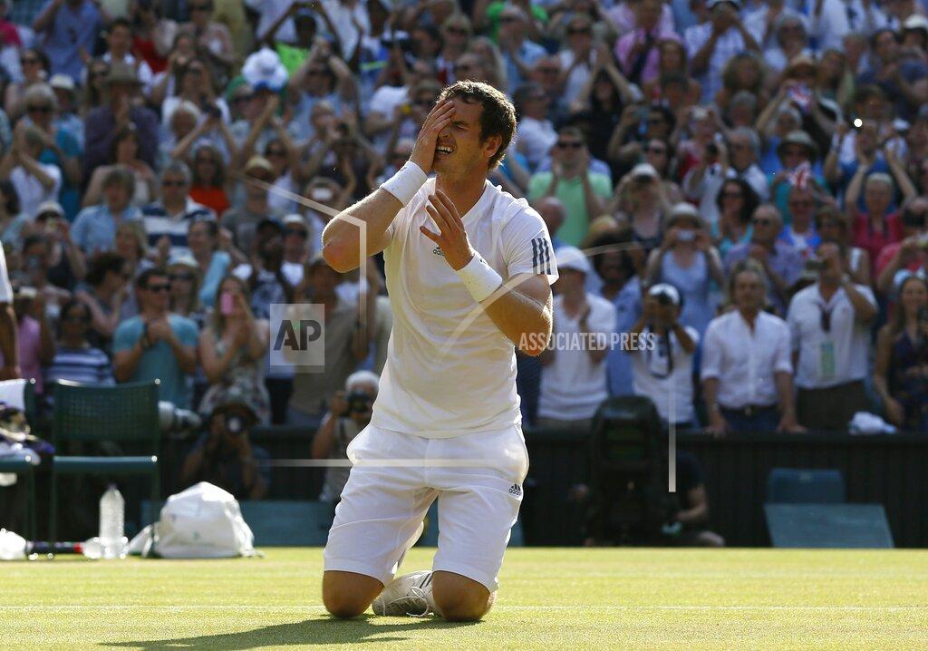 Kirsty Wigglesworth FILE - In this July 7, 2013, file photo, Andy Murray of Britain reacts after winning against Novak Djokovic of Serbia in the men's singles final match at the All England Lawn Tennis Championships in Wimbledon, London. (AP Photo/Kirsty Wigglesworth, File)
