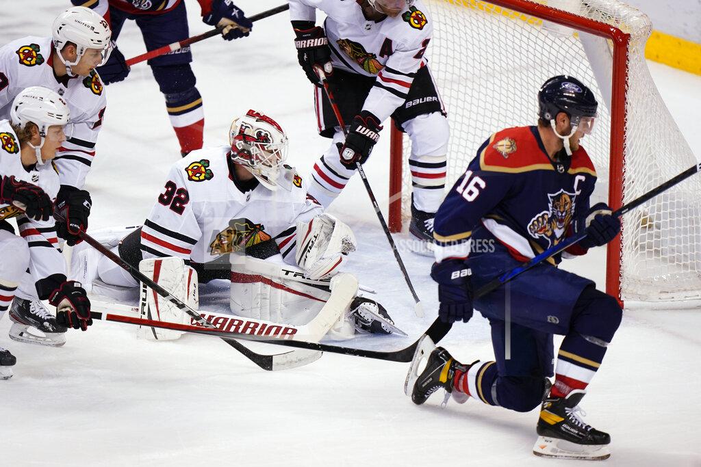 Wilfredo Lee Florida Panthers center Aleksander Barkov (16) celebrates after scoring a goal during the second period of the team's NHL hockey game against the Chicago Blackhawks, Saturday, March 13, 2021, in Sunrise, Fla. (AP Photo/Wilfredo Lee)
