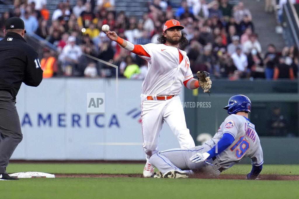 Tony Avelar San Francisco Giants shortstop Brandon Crawford throws to first base after forcing out New York Mets' Mark Canha (19) during during the second inning of a baseball game in San Francisco, Tuesday, May 24, 2022. Dominic Smith was safe at first. (AP Photo/Tony Avelar)