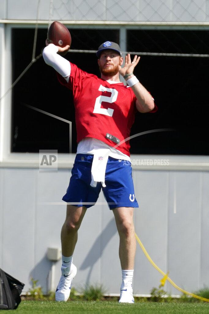 Darron Cummings Indianapolis Colts quarterback Carson Wentz (2) throws during NFL football practice, Thursday, May 20, 2021, in Indianapolis. (AP Photo/Darron Cummings)