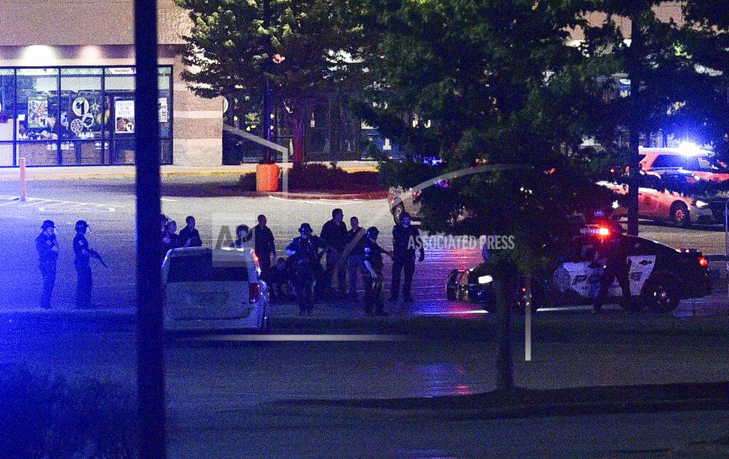 Meg Mclaughlin Heavy police presence surrounds the Walmart on West Kimberly Road after reports of gunfire Monday, June 1, 2020, in a round of rioting and violence that occurred Sunday night into Monday morning in Davenport. (Meg McLaughlin/Quad City Times via AP)