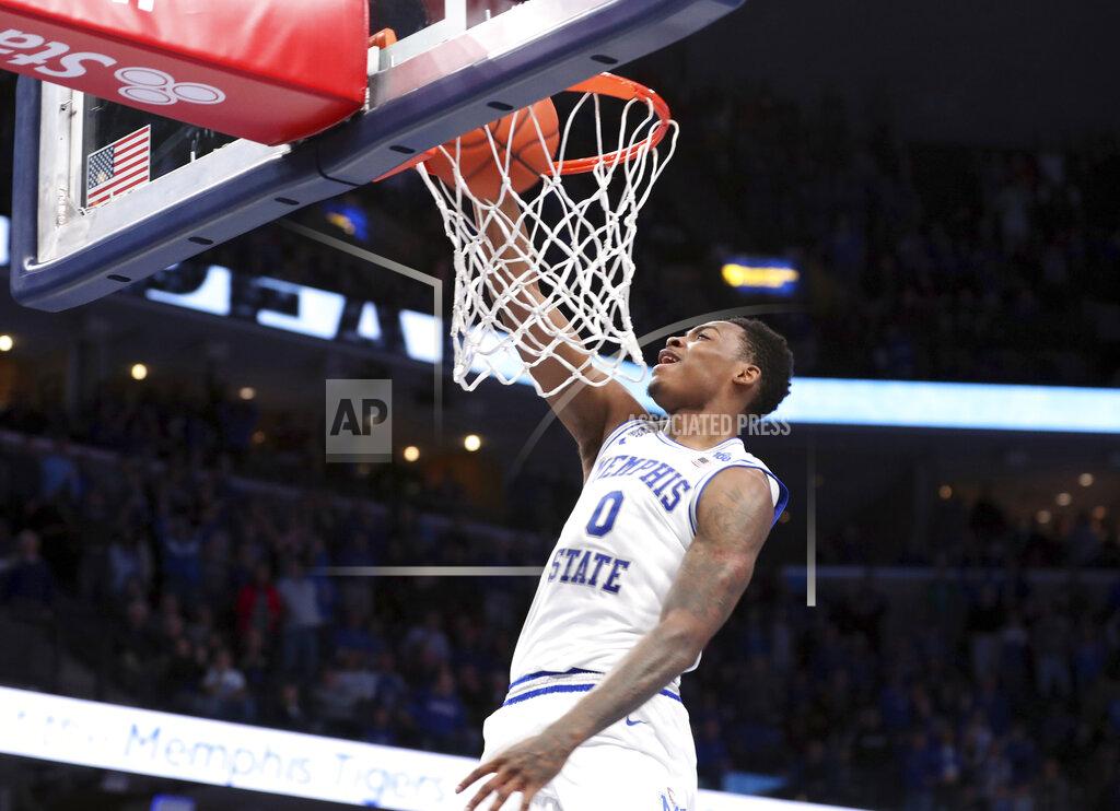 Karen Pulfer Focht Memphis' D. J. Jeffries (0) dunks a basket in the second half of an NCAA college basketball game against Mississippi, Saturday, Nov. 23, 2019, in Memphis, Tenn. (AP Photo/Karen Pulfer Focht)