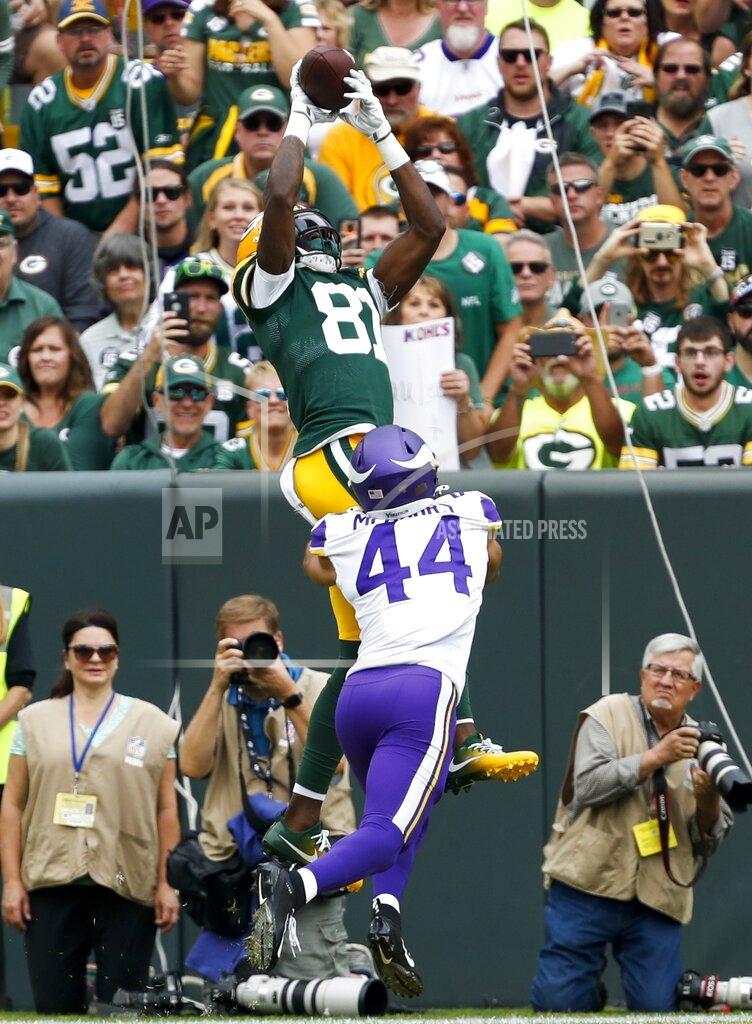 Matt Ludtke Green Bay Packers' Geronimo Allison catches a touchdown pass over Minnesota Vikings' Nate Meadors during the first half of an NFL football game Sunday, Sept. 15, 2019, in Green Bay, Wis. (AP Photo/Matt Ludtke)