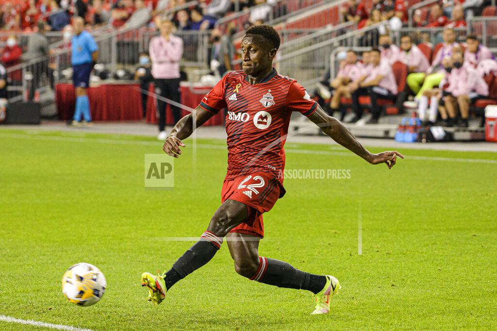 Christopher Katsarov Toronto FC defender Rocco Romeo kicks the ball during the first half of the team's MLS soccer match against Inter Miami on Tuesday, Sept. 14, 2021, in Toronto. (Christopher Katsarov/The Canadian Press via AP)