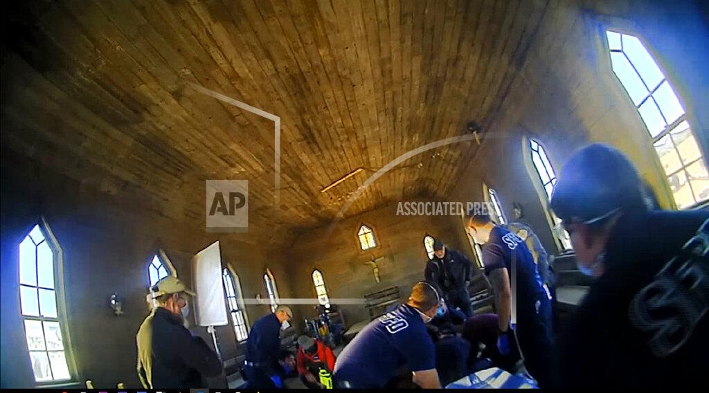 Uncredited In this image from video released by the Santa Fe County Sheriff's Office, is the scene inside a small church on a movie set following a fatal shooting last year in Santa Fe, N.M. On Monday April, 25, 2022, law enforcement officials released a trove of video and photographic evidence in the investigation of a fatal October shooting of a cinematographer by actor and producer Alec Baldwin on the set of a Western movie. (Santa Fe County Sheriff's Office via AP)