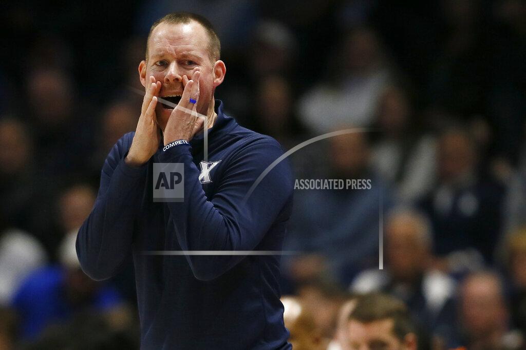 Sam Greene Xavier head coach Travis Steele calls out from the sideline in the first half of an NCAA college basketball game against Marquette at Cintas Center in Cincinnati on Saturday, Dec. 18, 2021. (Sam Greene/The Cincinnati Enquirer via AP)