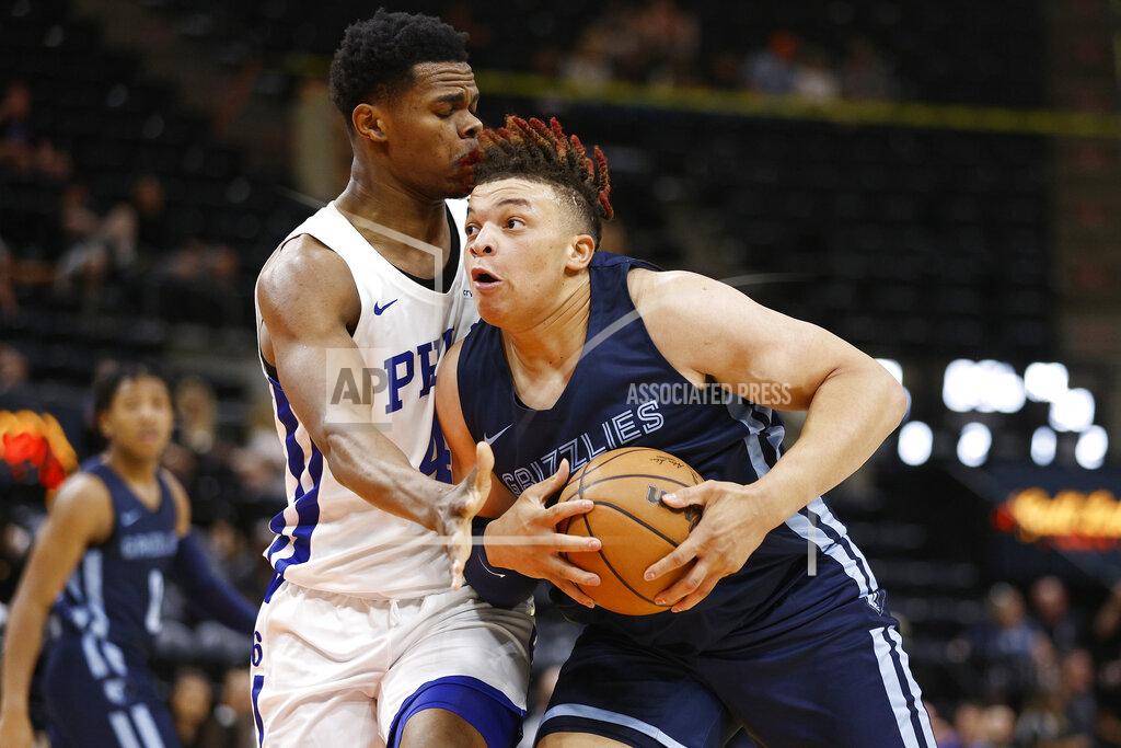 Jeff Swinger Memphis Grizzlies forward Kenny Lofton Jr., right, drives to the basket against Philadelphia 76ers forward Michael Foster Jr. during the first half of an NBA summer league basketball game Tuesday, July 5, 2022, in Salt Lake City. (AP Photo/Jeff Swinger)