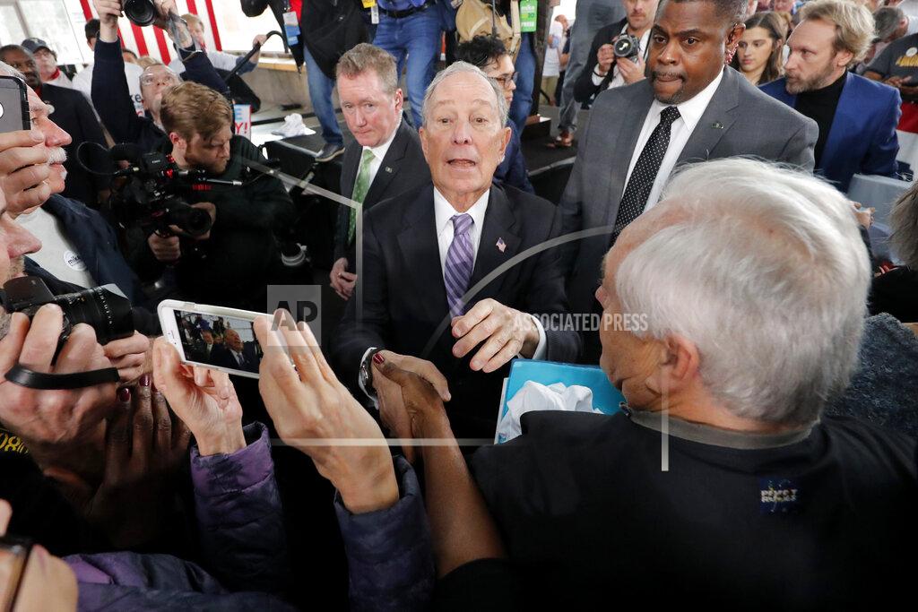 Democratic presidential candidate and former New York City Mayor Mike Bloomberg greets supporters after speaking at a campaign event in Raleigh, N.C., Thursday, Feb. 13, 2020. (AP Photo/Gerald Herbert)