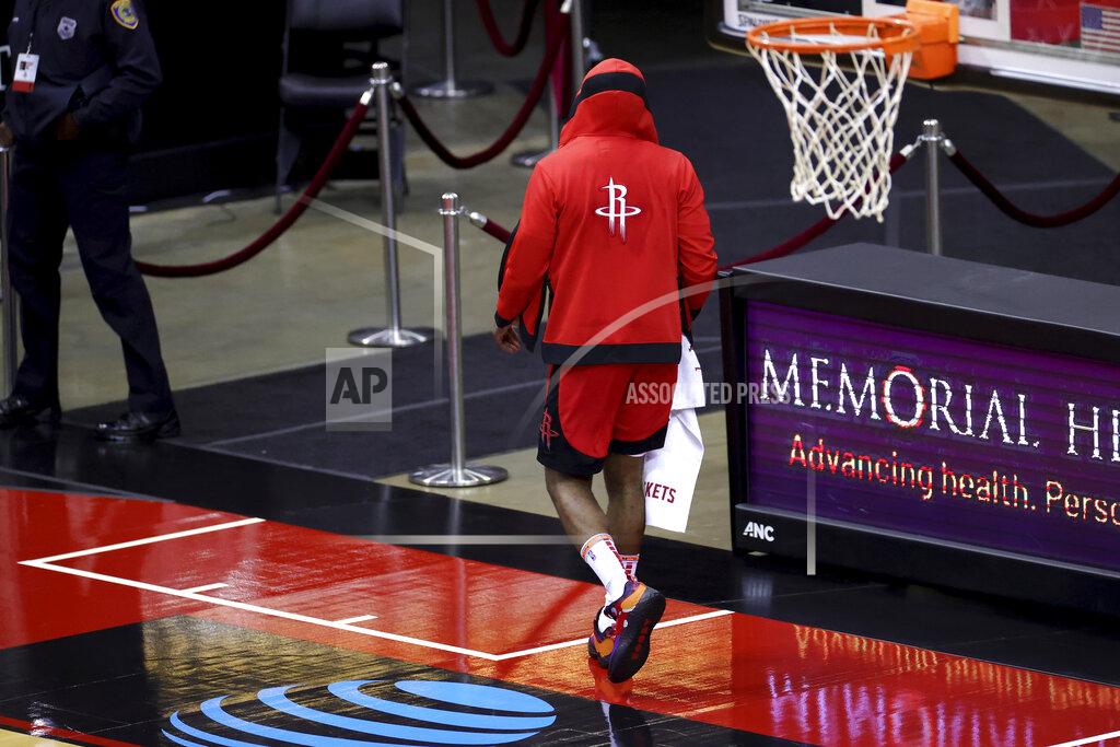 Houston Rockets' James Harden leaves the court following a loss to the Los Angeles Lakers in an NBA basketball game Sunday, Jan. 10, 2021, in Houston. (Carmen Mandato/Pool Photo via AP)