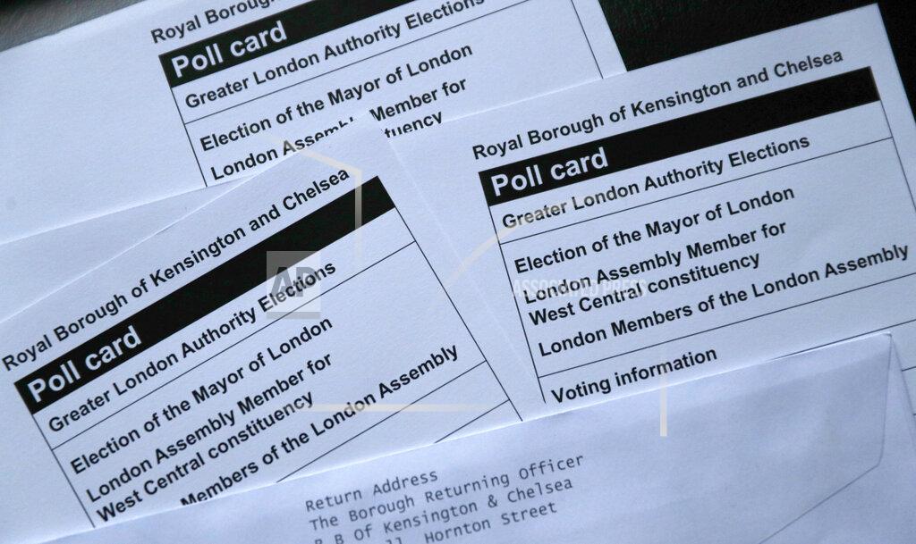 Alastair Grant Three polling cards for the London Mayoral election and local councillors, from the Royal Borough of Kensington and Chelsea, photographed in London on Thursday, April 29, 2021. Brexit and the coronavirus pandemic have hit London in a perfect storm. On May 6, Londoners will elect a mayor, whose performance will help determine whether this is the start of a period of decline for Europe's biggest city — or a chance to do things better. Current Mayor Sadiq Khan, who is favored to win re-election, says his top priority is preserving jobs threatened by the economic blow of the pandemic. Rival Shaun Bailey says his top priority is crime. Whoever wins will face the challenge of leading London's fightback from its biggest shock for generations. (AP Photo/Alastair Grant)