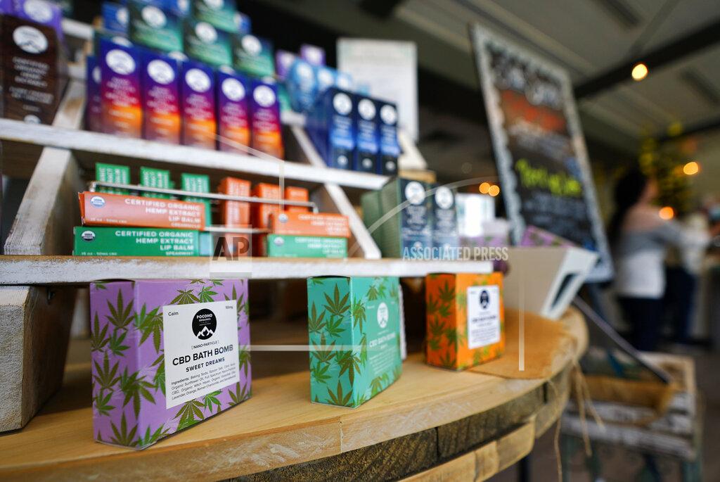 Matt Slocum CBD products are seen for sale at Pocono Organics farm adjacent to Pocono Raceway, Friday, June 25, 2021, in Long Pond, Pa. The 380 acre farm is the title sponsor for Saturday's NASCAR auto race, The Pocono Organics CBD 325, the first Cup race with a CBD sponsorship. (AP Photo/Matt Slocum)