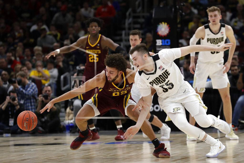 Nam Y. Huh Minnesota's Gabe Kalscheur (22) and Purdue's Sasha Stefanovic (55) battle for a loose ball during the second half of an NCAA college basketball game in the quarterfinals of the Big Ten Conference tournament, Friday, March 15, 2019, in Chicago. (AP Photo/Nam Y. Huh)