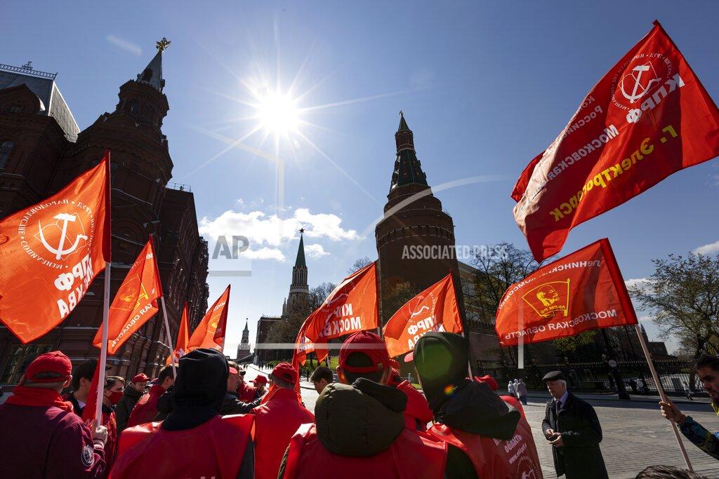 Alexander Zemlianichenko Communists party supporters gather with red flags to mark Labour Day, also knows as May Day near Red Square in Moscow, Russia, Saturday, May 1, 2021. (AP Photo/Alexander Zemlianichenko)