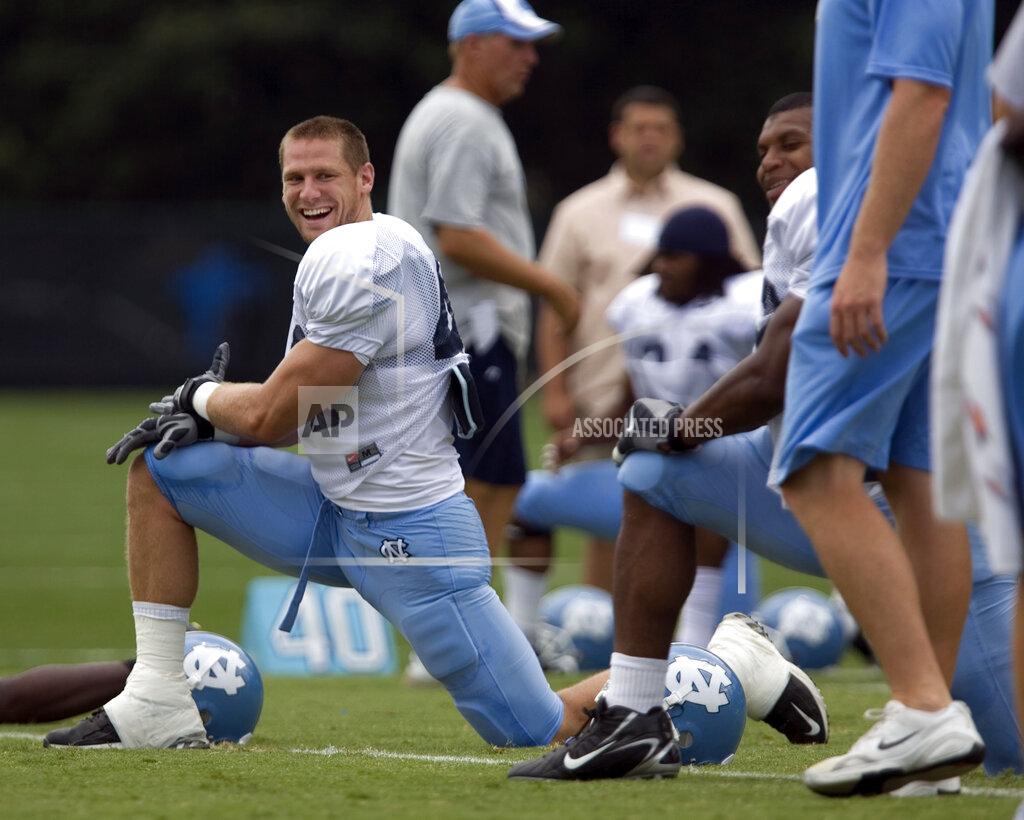 Robert Willett North Carolina linebacker Chase Rice smiles as he goes through stretching exercises with his teammates during practice in Chapel Hill, N.C., on Thursday Aug. 7, 2008. Chase Rice had his sights set on the NFL. Then the linebacker who tore up the ACC in 2006 tore up his left ankle in the season opener as a junior. It worked out pretty well for Rice in another area of entertainment. His current hit is a pairing with Florida Georgia Line: “Drinkin’ Beer. Talkin’ God. Amen.” (Robert Willett/The News & Observer via AP)
