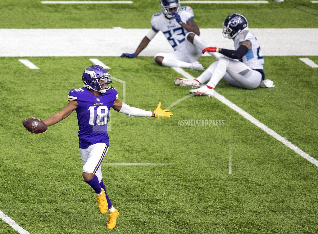 Elizabeth Flores Minnesota Vikings wide receiver Justin Jefferson celebrates after a 71-yard touchdown during the third quarter of an NFL football games against the Tennessee Titans, Sunday, Sept. 27, 2020 in Minneapolis. (Elizabeth Flores/Star Tribune via AP)