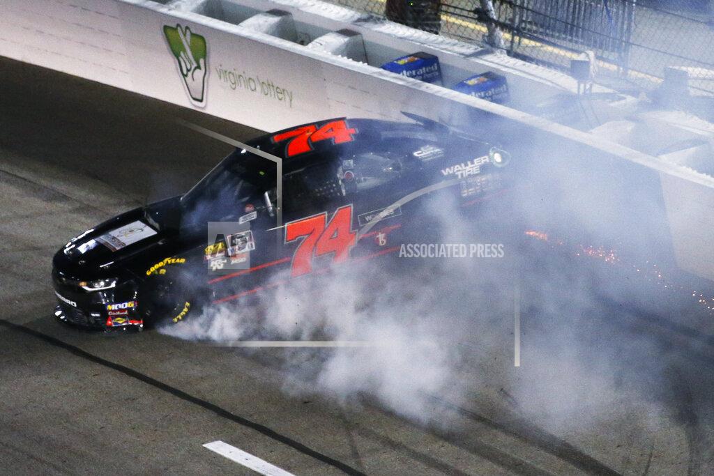 Steve Helber Tyler Matthews (74) hits the wall in Turn 2 during the NASCAR Xfinity Series auto race at Richmond Raceway in Richmond, Va., Friday, Sept. 20, 2019. (AP Photo/Steve Helber)