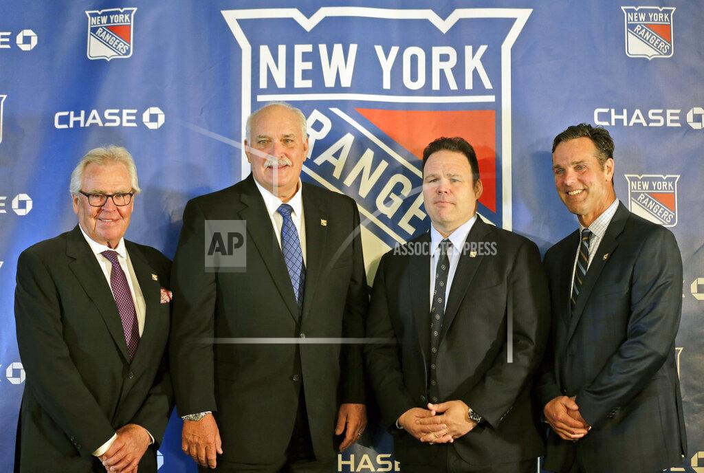 Seth Wenig FILE - in this Wednesday, May 22, 2019, file photo, John Davidson, the new president of the New York Rangers, second from left, poses for a picture with adviser to the owner, Glen Sather, left, general manager Jeff Gorton, second from right, and coach David Quinn during a news conference in New York. The New York Rangers abruptly fired president John Davidson and general manager Jeff Gorton on Wednesday, May 5, 2021 with three games left in the season. Chris Drury was named president and GM. He previously served as associate GM under Davidson and Gorton. (AP Photo/Seth Wenig)