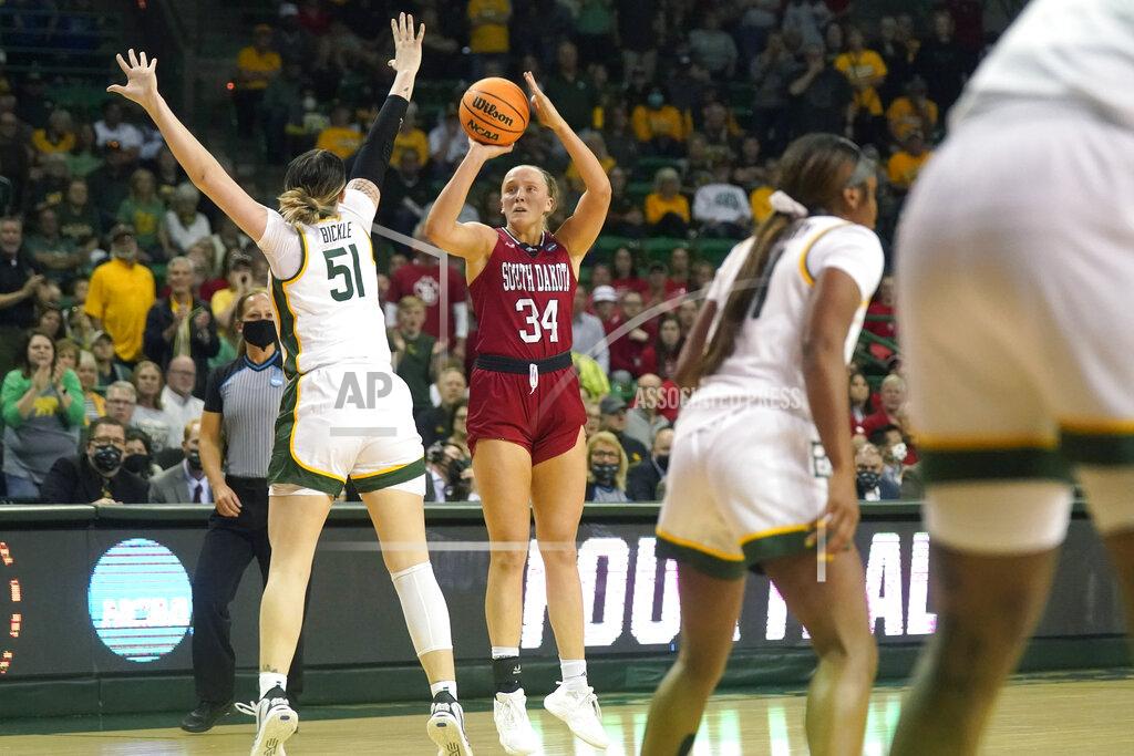 Lm Otero South Dakota center Hannah Sjerven (34) shoots agains Baylor forward Caitlin Bickle (51) during the first half of a college basketball game in the second round of the NCAA tournament in Waco, Texas, Sunday, March 20, 2022. (AP Photo/LM Otero)