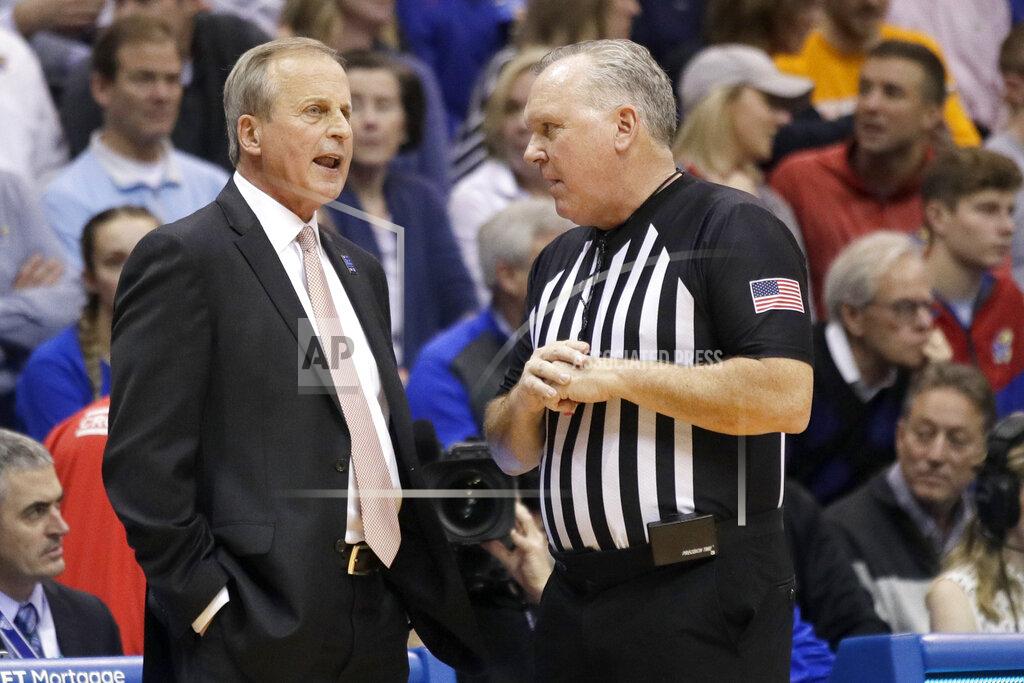 Orlin Wagner Tennessee head coach Rick Barnes, left, talks with referee James Luckie during the first half of an NCAA college basketball game against Kansas in Lawrence, Kan., Saturday, Jan. 25, 2020. (AP Photo/Orlin Wagner)