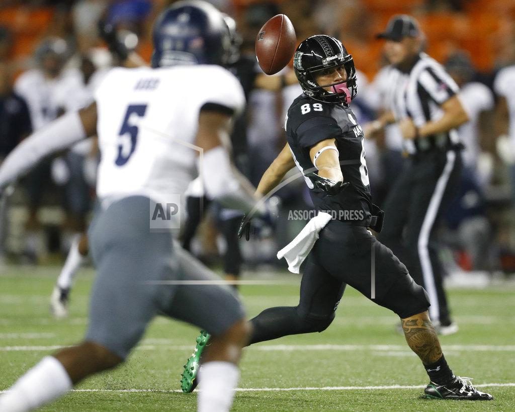 Marco Garcia Hawaii wide receiver Jason-Matthew Sharsh (89) fails to catch the ball against Nevada during the second quarter of an NCAA college football game Saturday, Oct. 20, 2018, in Honolulu. (AP Photo/Marco Garcia)