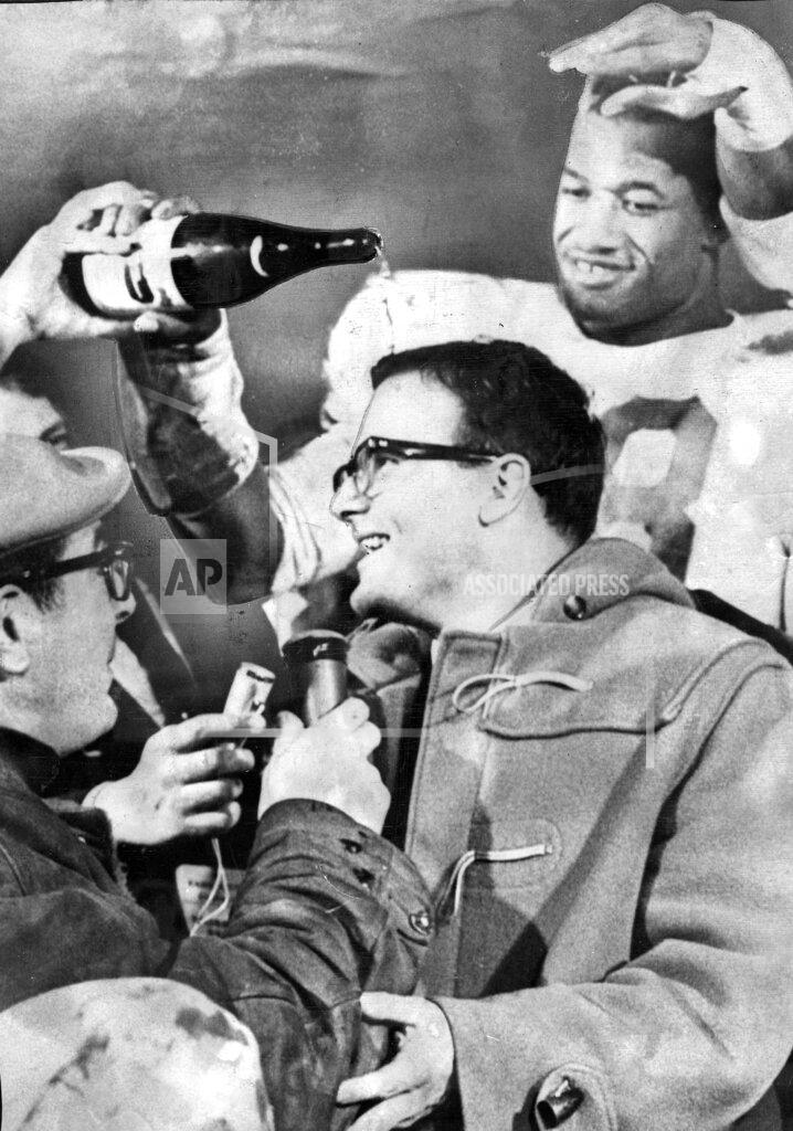 Anonymous FILE - In this Jan. 1, 1967, file photo, Kansas City Chiefs linebacker Bobby Bell pours champagne over the head of team owner Lamar Hunt after the Chiefs beat the Buffalo Bills to win the AFL championship game in Buffalo, N.Y. For one of the NFL’s proudest franchises, the wait to reach this weekend has been a long one, and the chance to hoist the Lamar Hunt Trophy _ named after the Chiefs’ founder _ has the city on the edge of its collective seat. (The Kansas City Star via AP, File)