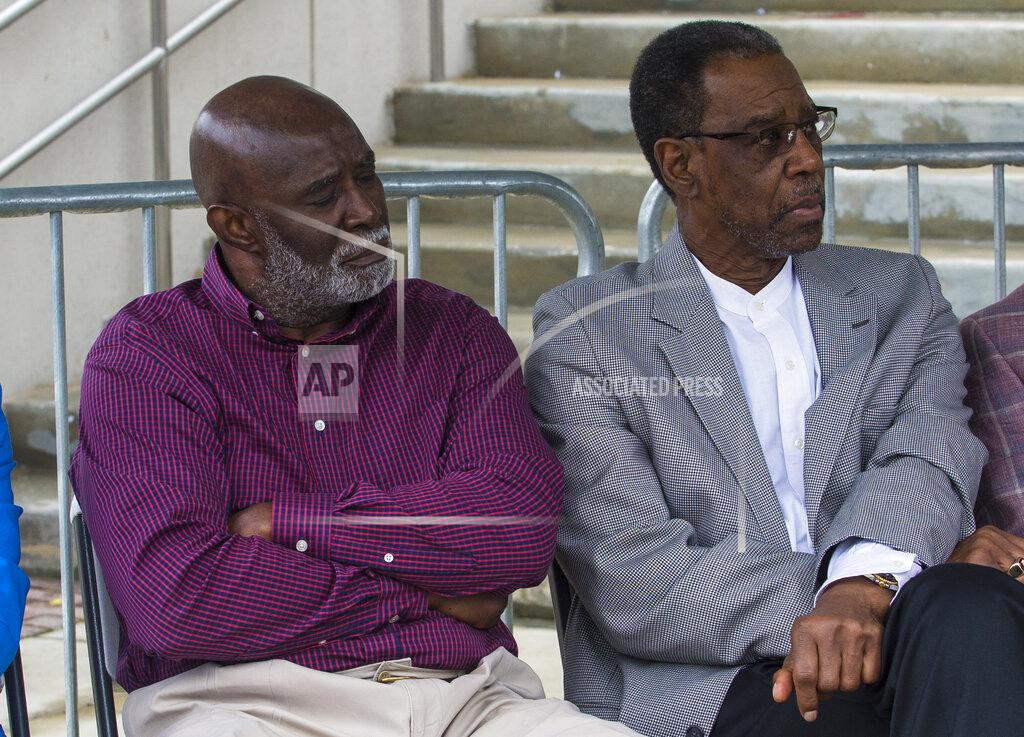 Vasha Hunt Wilbur Jackson, left, and John Mitchell listen to speakers at the John Mitchell and Wilbur Jackson Commemorative Plaque Unveiling before Alabama's A-Day NCAA college football scrimmage, Saturday, April 16, 2022, in Tuscaloosa, Ala. The pair broke the color barrier at Alabama. (AP Photo/Vasha Hunt)