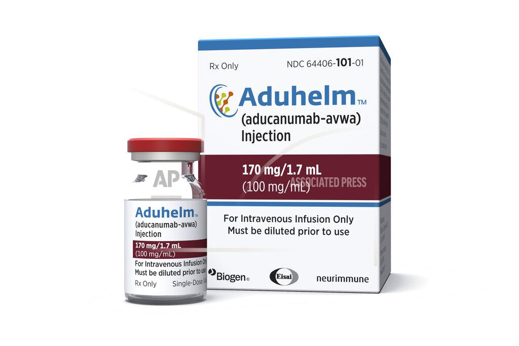Uncredited This image provided by Biogen on Monday, June 7, 2021 shows a vial and packaging for the drug Aduhelm. (Biogen via AP)