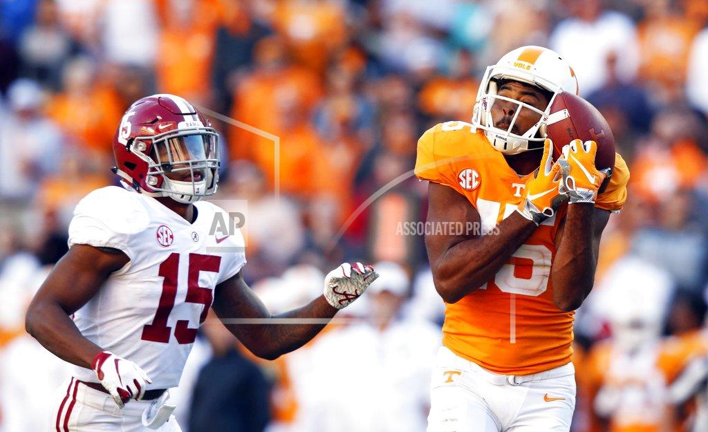 Wade Payne Tennessee wide receiver Jauan Jennings (15) catches a pass as he's defended by Alabama defensive back Xavier McKinney (15) in the first half of an NCAA college football game Saturday, Oct. 20, 2018, in Knoxville, Tenn. (AP Photo/Wade Payne)