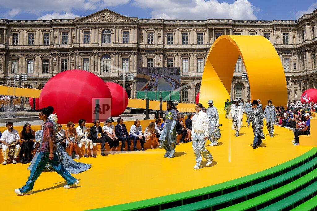 Francois Mori CORRECTS DATE Models wear creations as part of the Louis Vuitton men's Spring Summer 2023 collection presented in Paris, France, Thursday, June 23, 2022. (AP Photo/Francois Mori)