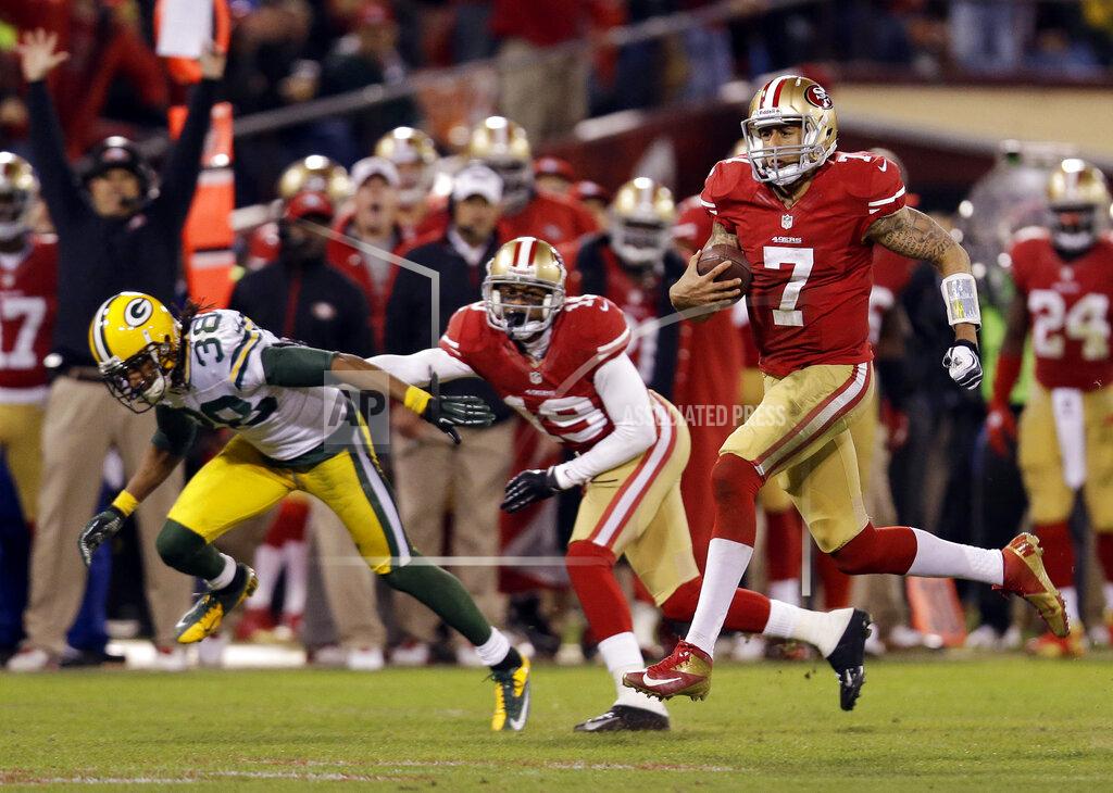 Marcio Jose Sanchez FILE - In this Jan. 12, 2013, file photo, San Francisco 49ers quarterback Colin Kaepernick (7) runs for a 56-yard touchdown against the Green Bay Packers during the third quarter of an NFC divisional playoff NFL football game, in San Francisco. The two teams that have combined for nine Super Bowl titles will meet with a spot in the ultimate game on the line once again when the 49ers (14-3) host the Packers (14-3) in the NFC championship game on Sunday, Jan. 19, 2020. (AP Photo/Marcio Jose Sanchez, File)